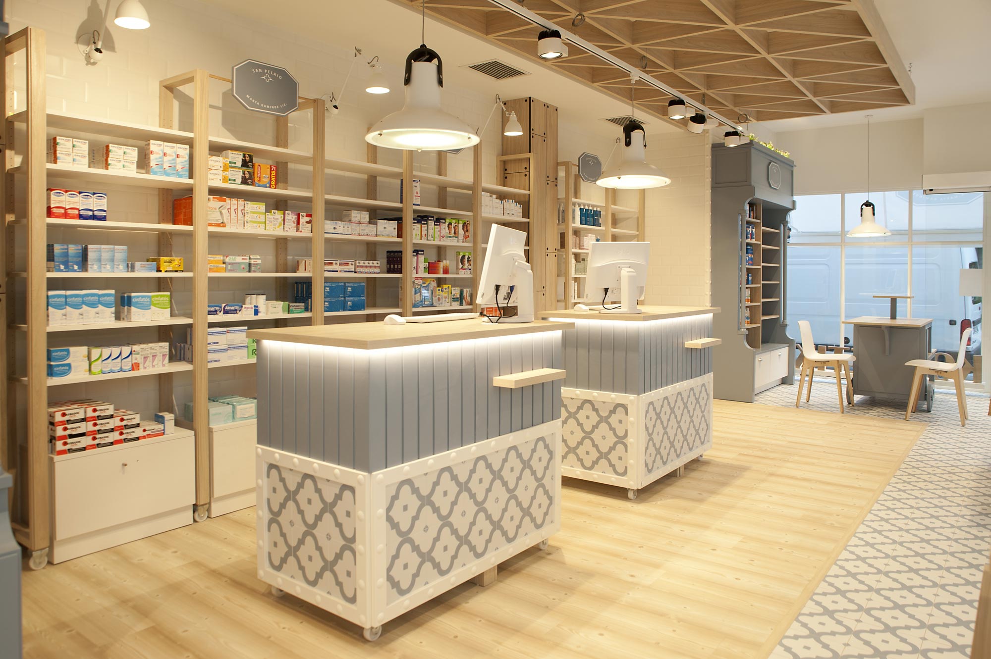 San Pelaio Pharmacy Lottus Wood Enea Design Sube Interiorismo